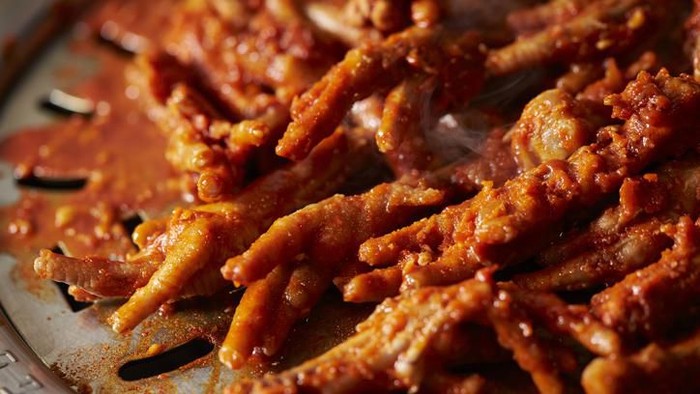 Beondegi on frying pan, Beondegi is a Korean street food made with silkworm pupae as boiled or steamed