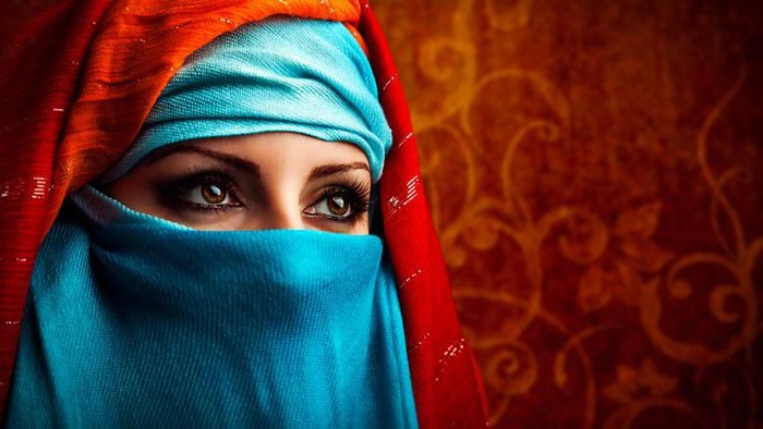 muslimah Fashion portrait of a Muslim woman wearing the hijab and looking at the camera