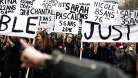 Para wanita di kawasan Paris turut melakukan aksi menentang kekerasan domestik berbasis gender di peringatan Hari Perempuan Internasional di Prancis. AP Photo/Thibault Camus.