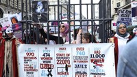 Protes terkait kekerasan berbasis gender juga turut dilakukan di kawasan London, Inggris. Aksi itu digelar bertepatan dengan peringatan Hari Perempuan Internasional. Yui Mok/PA via AP.