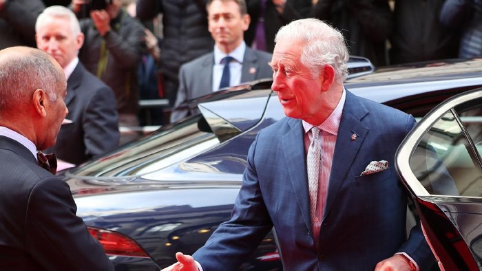 LONDON, ENGLAND - MARCH 11: Prince Charles, Prince of Wales goes to shake the hand of Sir Kenneth Olisa, The Lord-Lieutenant of Greater London (left) before he changes to use a Namaste gesture, as he arrives at the annual Princes Trust And TK Maxx & Homesense Awards at London Palladium on March 11, 2020 in London, England. (Photo by Yui Mok - WPA Pool/Getty Images)