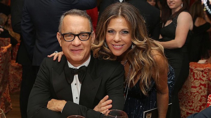 1139135034 HOLLYWOOD, CALIFORNIA - MARCH 29: Rita Wilson and Tom Hanks embrace as Wilson is honored with a star on the Hollywood Walk of Fame on March 29, 2019 in Hollywood, California. (Photo by Frazer Harrison/Getty Images)