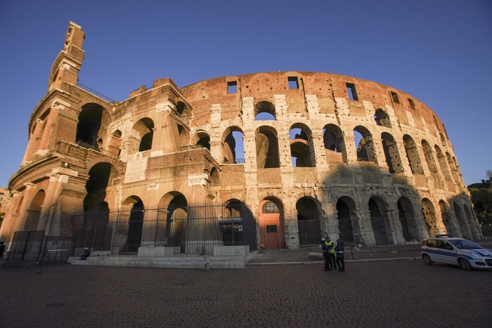 A view of the Colosseum that will be closed following the governments new prevention measures on public gatherings, in Rome, Sunday, March 8, 2020. Italy announced a sweeping quarantine early Sunday for its northern regions, igniting travel chaos as it restricted the movements of a quarter of its population in a bid to halt the new coronavirus relentless march across Europe. (AP Photo/Andrew Medichini)