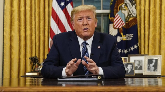 President Donald Trump speaks in an address to the nation from the Oval Office at the White House about the coronavirus Wednesday, March, 11, 2020, in Washington. (Doug Mills/The New York Times via AP, Pool)