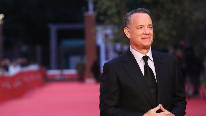 HOLLYWOOD, CALIFORNIA - OCTOBER 27: Tom Hanks speaks onstage during the Academy Of Motion Picture Arts And Sciences 11th Annual Governors Awards at The Ray Dolby Ballroom at Hollywood & Highland Center on October 27, 2019 in Hollywood, California. (Photo by Kevin Winter/Getty Images)