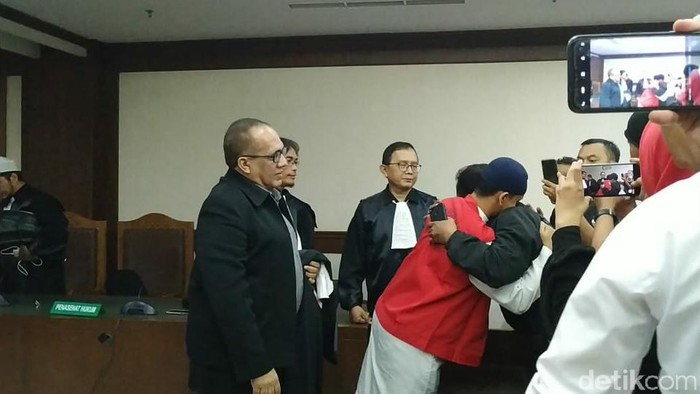 Hermawan, pria yang ancam memenggal Presiden Jokowi, usai menjalani sidang vonis di Pengadilan Negeri Jakarta Pusat.