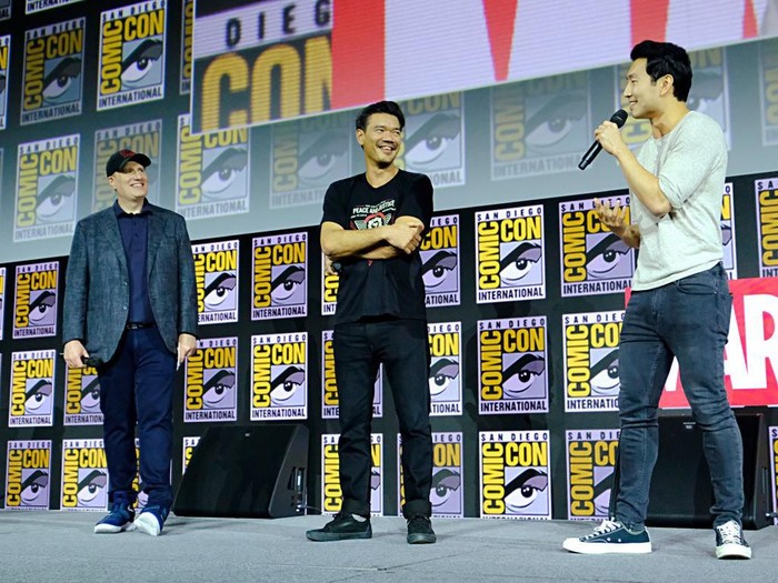 SAN DIEGO, CALIFORNIA - JULY 20: (L-R) President of Marvel Studios Kevin Feige, Director Destin Daniel Cretton and Simu Liu of Marvel Studios Shang-Chi and the Legend of the Ten Rings at the San Diego Comic-Con International 2019 Marvel Studios Panel in Hall H on July 20, 2019 in San Diego, California. (Photo by Alberto E. Rodriguez/Getty Images for Disney)