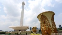 Suasana di kawasan Monumen Nasional (Monas) tampak sepi dari pengunjung, Minggu (15/3/2020).