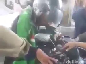Gojek Pastikan Driver Duduk Membeku di Atas Motor Tak Terkait Corona
