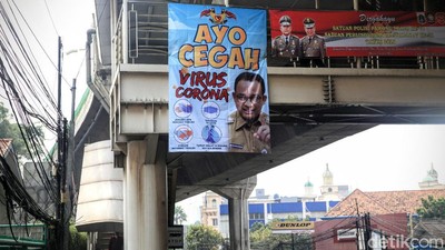 Spanduk Cegah Corona Bergambar Anies Mejeng di Tendean