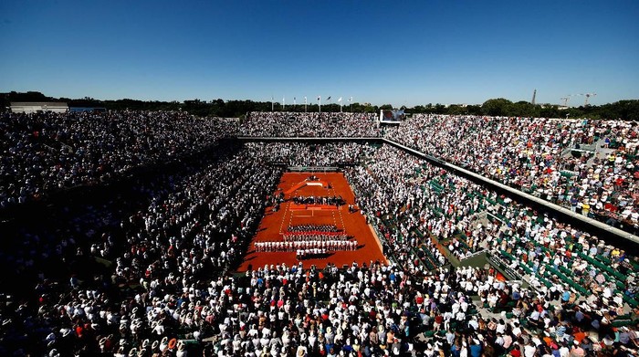 PARIS, FRANCE - JUNE 10:  A general view as Jelena Ostapenko of Latvia is awarded the trophy following victory in  the ladies singles final match against Simona Halep of Romania on day fourteen of the 2017 French Open at Roland Garros on June 10, 2017 in Paris, France.  (Photo by Adam Pretty/Getty Images)