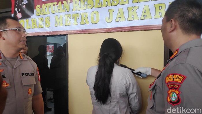 Tersangka penyebar video viral hoax terkait virus Corona di Pusat Grosir Cililitan (PGC), Jakarta Timur,