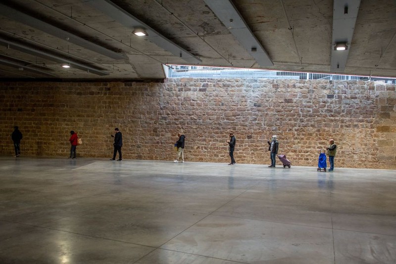 BEIJING, CHINA - MARCH 10: The empty courtyard of a usually busy shopping mall is seen on March10, 2020 in Beijing, China.  In Beijing, the normally bustling capital has fallen into a rhythm of social distancing that is widely accepted as the new norm after two months of restrictions to stop the disease from spreading. Millions of people are still working from home, schools and entertainment venues remain closed, and even commutes on some public transit need to be pre-booked to control crowds.  At the same time, China has been grappling with how to restart and revive the world's second largest economy without triggering another wave of infections, especially in the home of the country's political leadership.  So, while the cautious return of economic activity in Beijing has meant more road traffic and street life during the day, evening brings a return to the familiar quiet anxiety that has defined China's efforts to contain the virus.  After sunset, a majority of people avoid mingling or limit their interactions, and largely retreat to home. Retail stores follow reduced hours of operation, restaurants limit the number of people who can dine, and large gatherings are still banned. Residential areas have controls in place to restrict entry, and tighter quarantine rules require people returning to Beijing from other cities or countries to abide by a 14-day isolation period that is monitored and enforced.  Authorities are sensitive to so-called imported cases of the coronavirus with nearly 81,000 cases of COVID-19 in China and more than 3200 deaths, mostly in and around the city of Wuhan, in central Hubei province, where the outbreak first started. (Photo by Kevin Frayer/Getty Images)