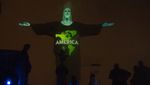 Deretan Bendera Negara Terpapar Corona Hiasi Patung Yesus di Brasil