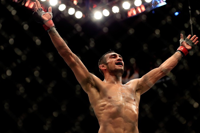 LAS VEGAS, NV - DECEMBER 06:  Tony Ferguson celebrates after defeating Abel Trujillo in their fight during the UFC 181 event at the Mandalay Bay Events Center on December 6, 2014 in Las Vegas, Nevada.  (Photo by Alex Trautwig/Getty Images)