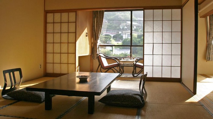 Sitting room with shoji screen inside Japanese inn in Owakudani, Japan.