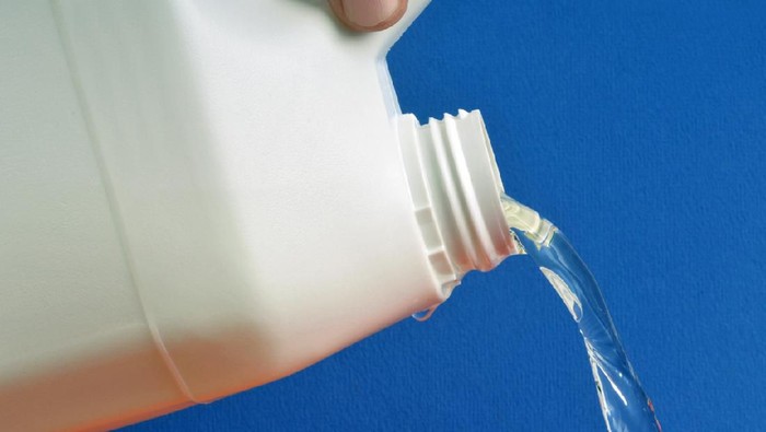 Cleaning with spray detergent, rubber gloves and dish cloth on work surface concept for hygiene