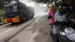 Saat Water Canon Dikerahkan untuk Semprotkan Disinfektan