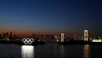 Suasana yang sunyi di kawasan Odaiba Marine Park Tokyo, Jepang. Wabah COVID-19 membuat Olimpiade 2020 yang akan diselenggarakan di Tokyo ditunda. Getty Images/Clive Rose.