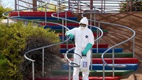 Penyemprotan disinfektan di taman bermain itu dilakukan dua kali sehari.