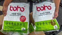 Sebanyak 9.750 unit baju pelindung diri bantuan dari Kementerian Kesehatan juga diberikan kepada Pemprov Jateng untuk selanjutnya didistribusikan ke sejumlah rumah sakit di Jateng yang menangani pasien terjangkit virus Corona (COVID-19). ANTARA FOTO/Aji Styawan.  