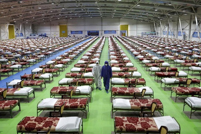 Iran Rombak Gedung Pertemuan Jadi RS Darurat Corona Wabah virus Corona berdampak cukup besar di Iran. Guna memberikan perawatan maksimal bagi pasien COVID-19, Iran rombak gedung pertemuan jadi RS Darurat Corona.