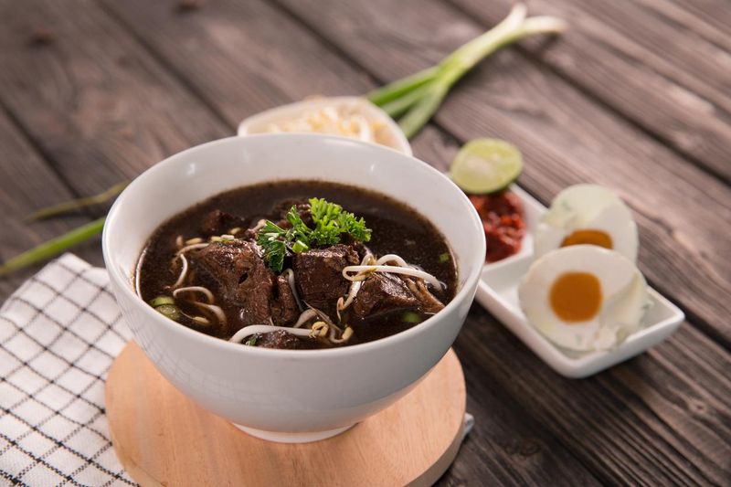 Rawon. traditional Indonesian beef black soup culinary