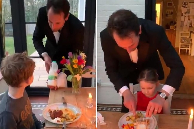 Tidak bisa pergi ke luar rumah, maka ayah yang satu ini membuat suasana seperti di restoran di dalam rumahnya. Pria tersebut berperan sebagai pelayan dan kedua anaknya menjadi tamu restoran. Ayah idaman banget nggak sih? Foto: Twitter BigBenMoore