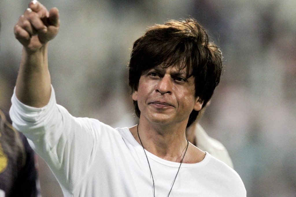 Shah Rukh Khan, Bollywood actor and Kolkata Knight Riders co-owner gestures the people in the stadium after his team won the match against Mumbai Indians at the VIVO IPL cricket T20 in Kolkata, India, Sunday, April 28, 2019. (AP Photo/Bikas Das)
