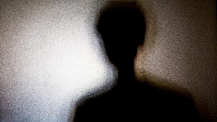 person shadows with Frosted glass - violations concept background