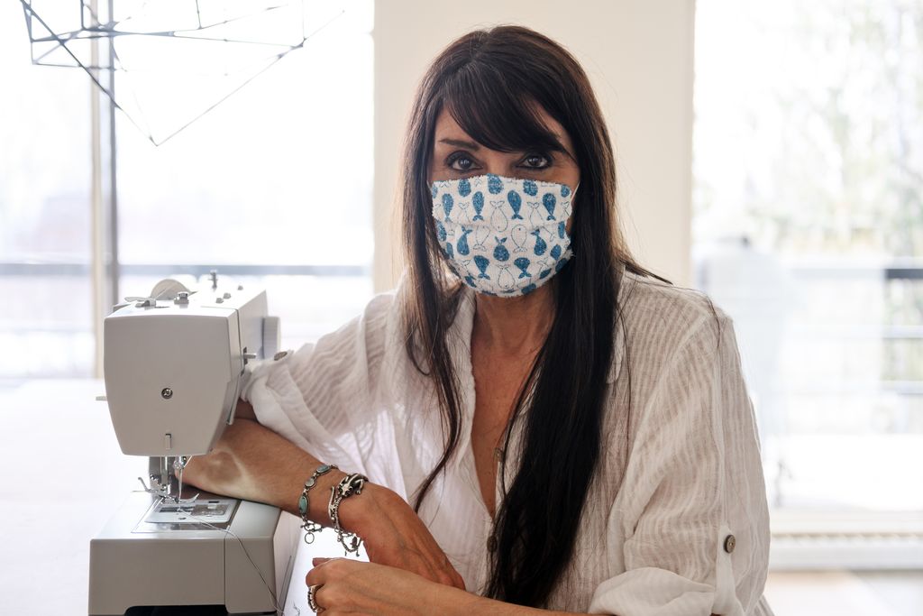 Women sewing protective mask, Quebec, Canada