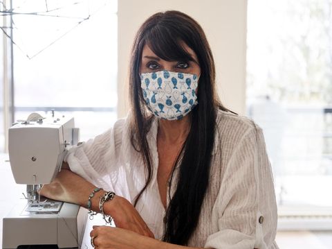 Women sewing protective mask, Quebec, Canada