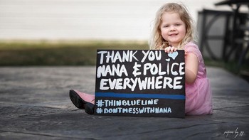 Anak perempuan ini berterima kasih kepada para perawat dan polisi di seluruh dunia.