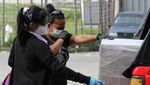 Potret Tangisan Duka Keluarga Korban Corona
