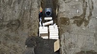 Begini potret pemakaman massal disebuah parit di Pulau Hart, Bronx, New York.