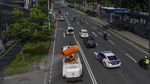 Mobil Gunner Spray Wara-wiri Cegah Corona di Jakarta