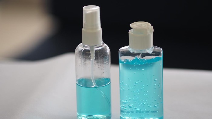 hand sanitizer alcoholic 70 percent in clear Plastic bottle Spray, and Hand Sanitizer gel on white table washing clean dirty to prevent germs protect colona virus, covid 19