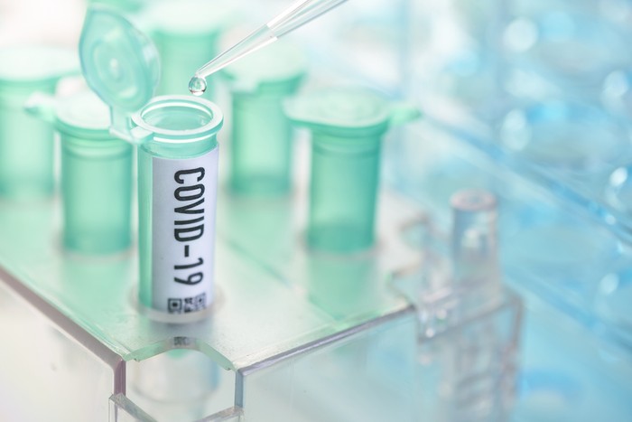 Corona virus: vial with pipette in laboratory