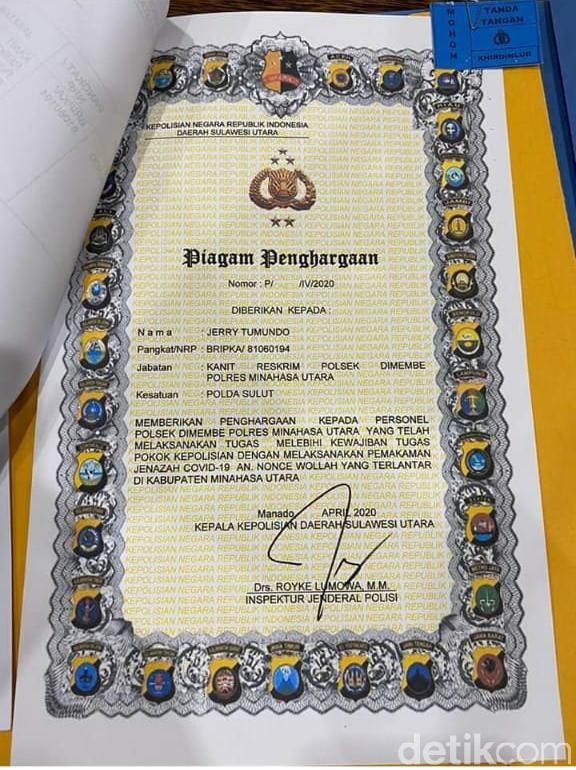 Piagam penghargaan untuk Bripka Jerry yang memakamkan korban Corona (Dok. Istimewa)