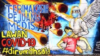 Mural tersebut bertuliskan Terimaksih Pejuang Medis Lawan Covid-19.