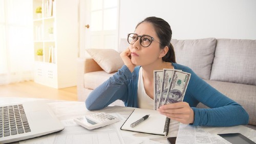 woman worried about the expend