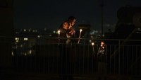 Sebuah keluarga merayakan paskah di rumah di Yunani. AP Photo/Michael Varaklas
