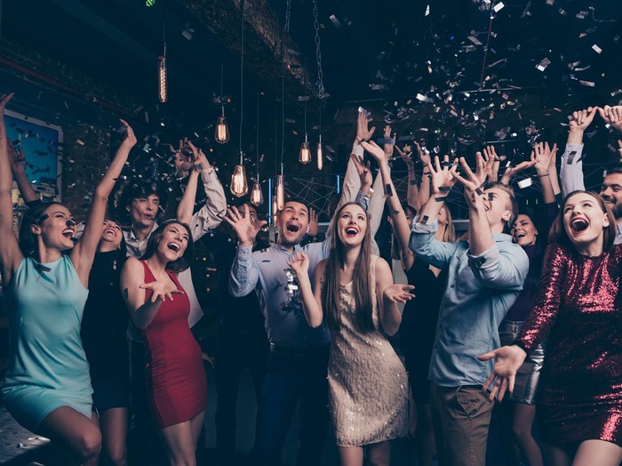 Nice-looking attractive gorgeous glamorous elegant stylish cheerful cheery, positive girls and guys having fun bachelor graduate occasion in fashionable luxury place night-club indoors