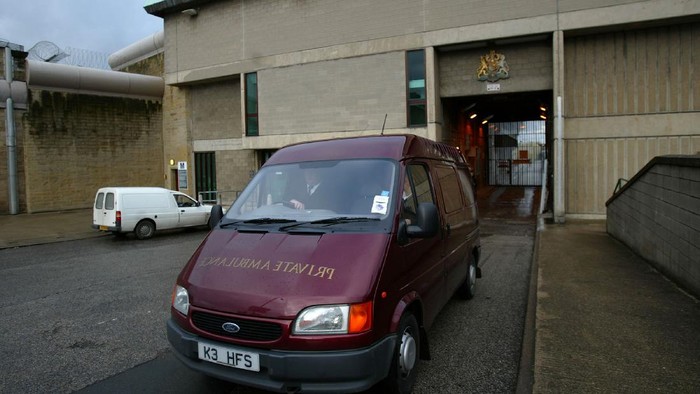 WAKEFIELD, ENGLAND - JANUARY 13: A funeral director van leaves Wakefield prison where convicted serial killer Dr Harold Shipman was found dead hanging in his cell on January 13, 2004. Shipman, nicknamed 