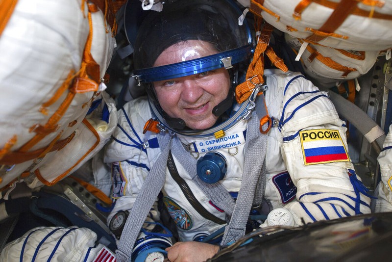 In this handout photo released by Gagarin Cosmonaut Training Centre (GCTC), Roscosmos space agency, U.S. astronauts Andrew Morgan, left, Jessica Meir, right, and Russian cosmonaut Oleg Skripochka sit in chairs shortly after the landing of the Russian Soyuz MS-15 space capsule near Kazakh town of Dzhezkazgan, Kazakhstan, Friday, April 17, 2020. An International Space Station crew has landed safely after more than 200 days in space. The Soyuz capsule carrying NASA astronauts Andrew Morgan, Jessica Meir and Russian space agency Roscosmos' Oleg Skripochka touched down on Friday on the steppes of Kazakhstan. (Andrey Shelepin, Gagarin Cosmonaut Training Centre (GCTC), Roscosmos space agency, via AP)