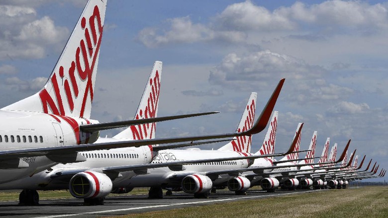 Maskapai Virgin Australia kolaps akibat pandemi Corona. Saat ini, banyak armada Virgin yang dikandangkan.