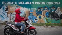 Mural tersebut dibuat bertujuan untuk mensosialisasikan dan mengedukasi warga agar tetap waspada terhadap potensi penyebaran virus corona atau COVID-19. ANTARA FOTO/Umarul Faruq