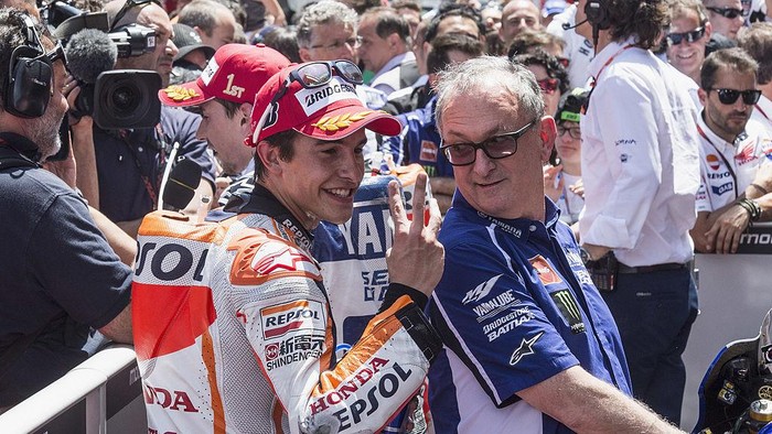 MONTMELO, SPAIN - JUNE 16:   Marc Marquez of Spain and Repsol Honda Team celebrates under the podium the third palce at the end of the MotoGP race during the MotoGp Of Catalunya - Race at Circuit de Catalunya on June 16, 2013 in Montmelo, Spain.  (Photo by Mirco Lazzari gp/Getty Images)