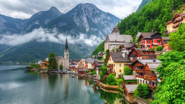 Hallstatt village in Alps at cloudy day, Austria
