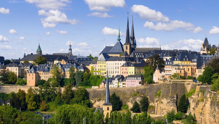 View of the Luxembourg Old Town with the towers of the Notre Dame Cathedral under a nicely clouded sky